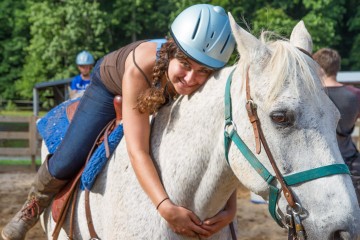 girl-hugs-horse